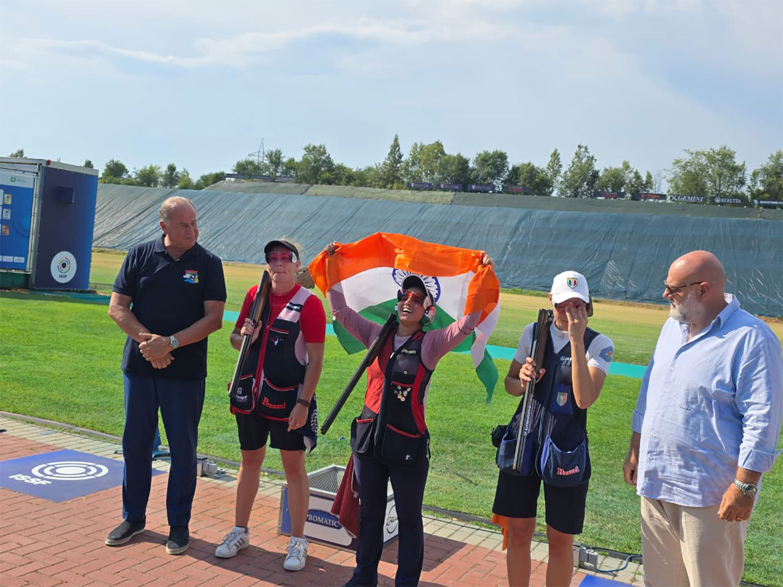 Neeru Dhanda with Indian flag after winning gold medal in trap event at ISSF World Cup 2026 in Italy. (Photo: ISSF) Neeru Dhanda with Indian flag after winning gold medal in trap event at ISSF World Cup 2026 in Italy. (Photo: ISSF)