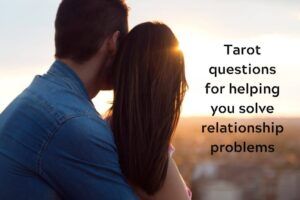 Couple hugging from behind in a field at sunset with caption: "Tarot questions for helping you solve relationship problems"