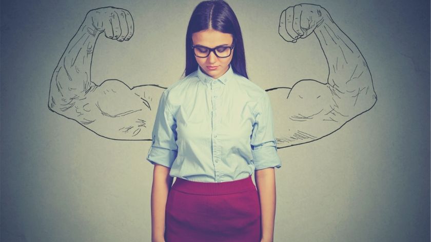 a woman with powerful arms showing self love and acceptance 