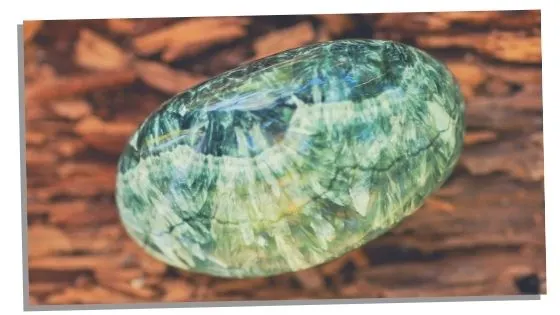 Seraphinite crystal on a table