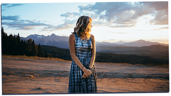 Omega female standing alone in field 