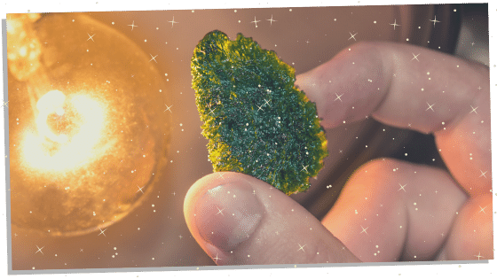 Moldavite being held for good luck 