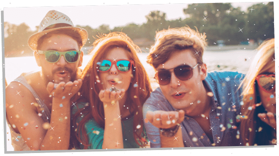 a group of people blowing kisses