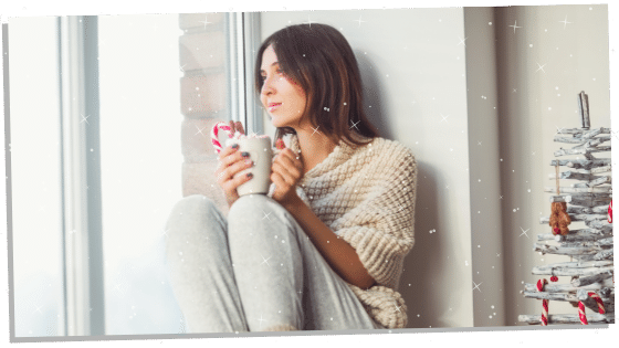 an introvert empath sitting by the window