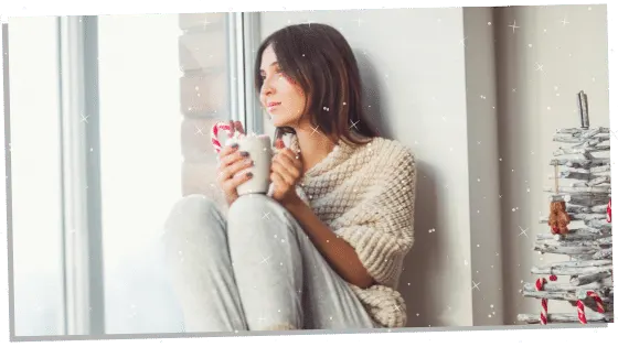 an introvert empath sitting by the window