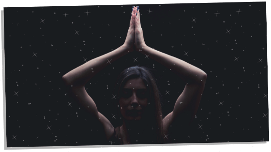 woman meditating in the dark