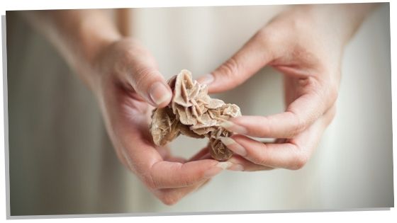 Holding Desert rose crystal