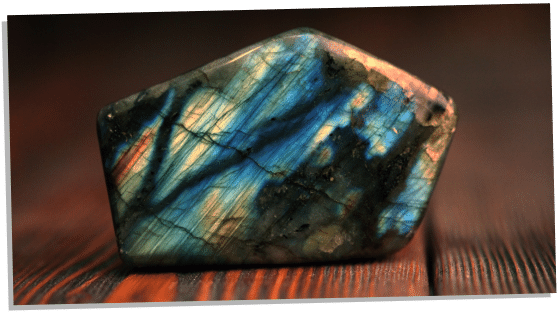 Labradorite on wooden surface