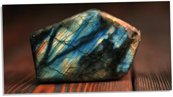 Labradorite on wooden surface