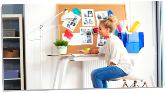 woman sitting with her vision board list