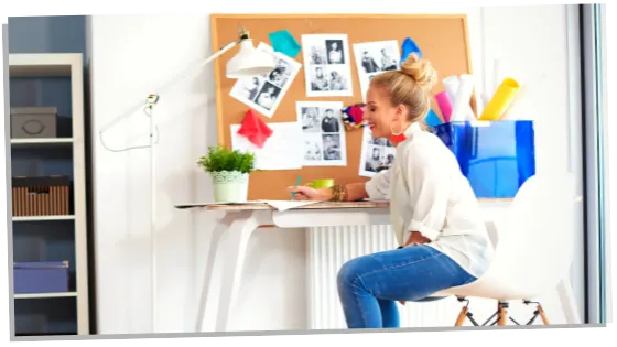 woman sitting with her vision board list