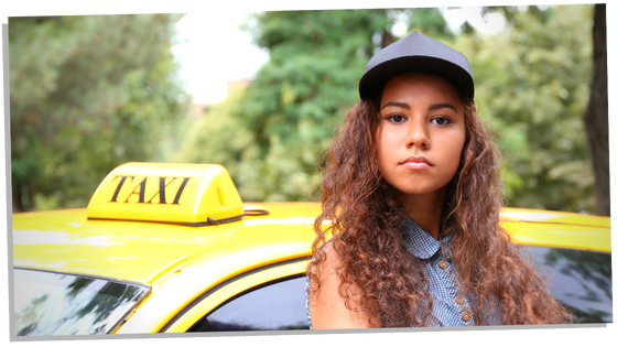 Woman driving a taxi