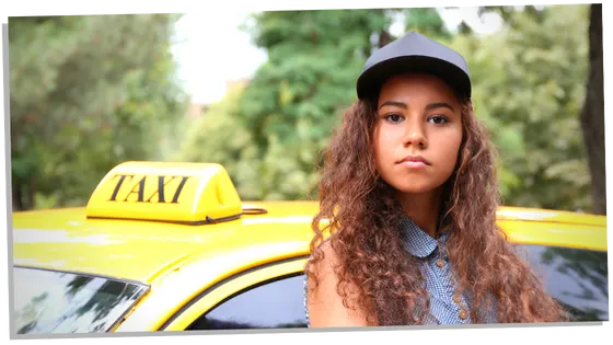 Woman driving a taxi