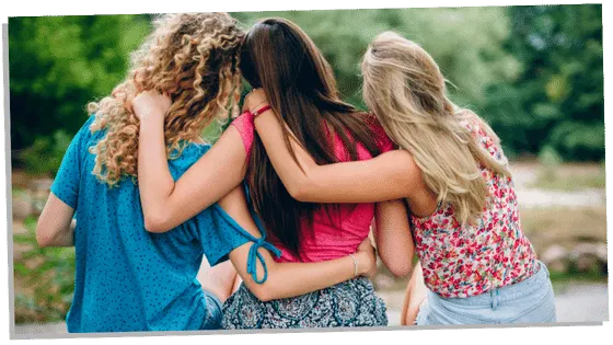 Group of friends hugging 