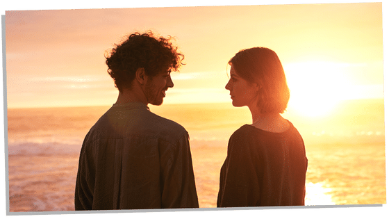 Soulmates couple sharing a romantic moment by the sea