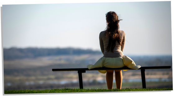 Woman sitting on a bench 