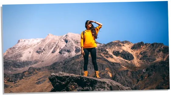 Woman climbing the mountain