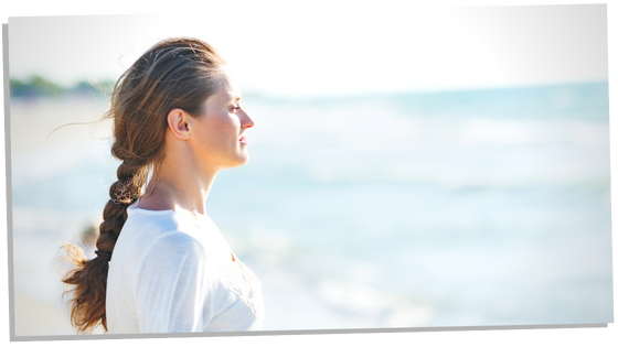 Woman gazing at the sea