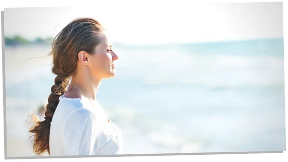 Woman gazing at the sea