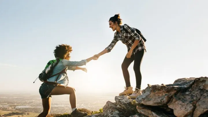 Image of a man lifting someone up