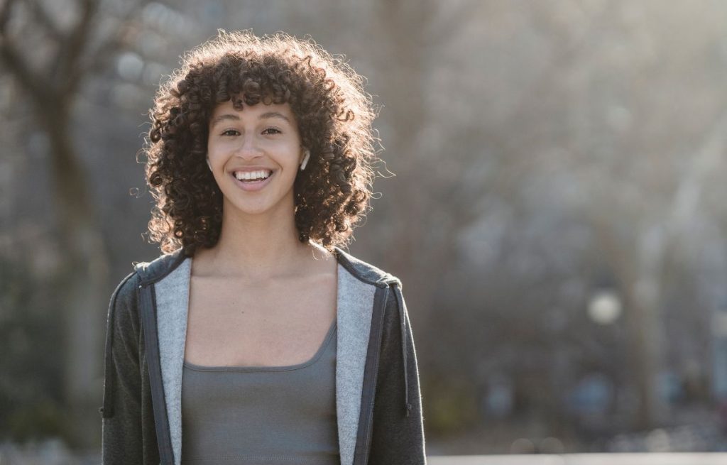 happy woman who feels optimistic 